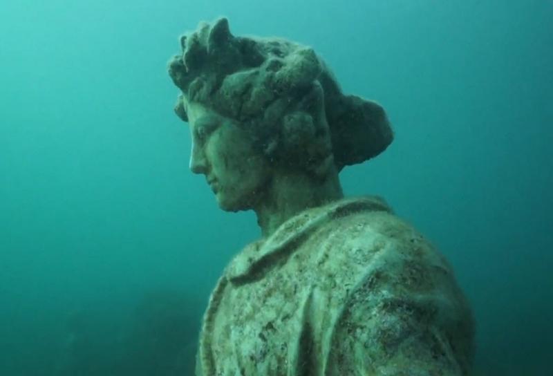 under water statue in sunken Baia